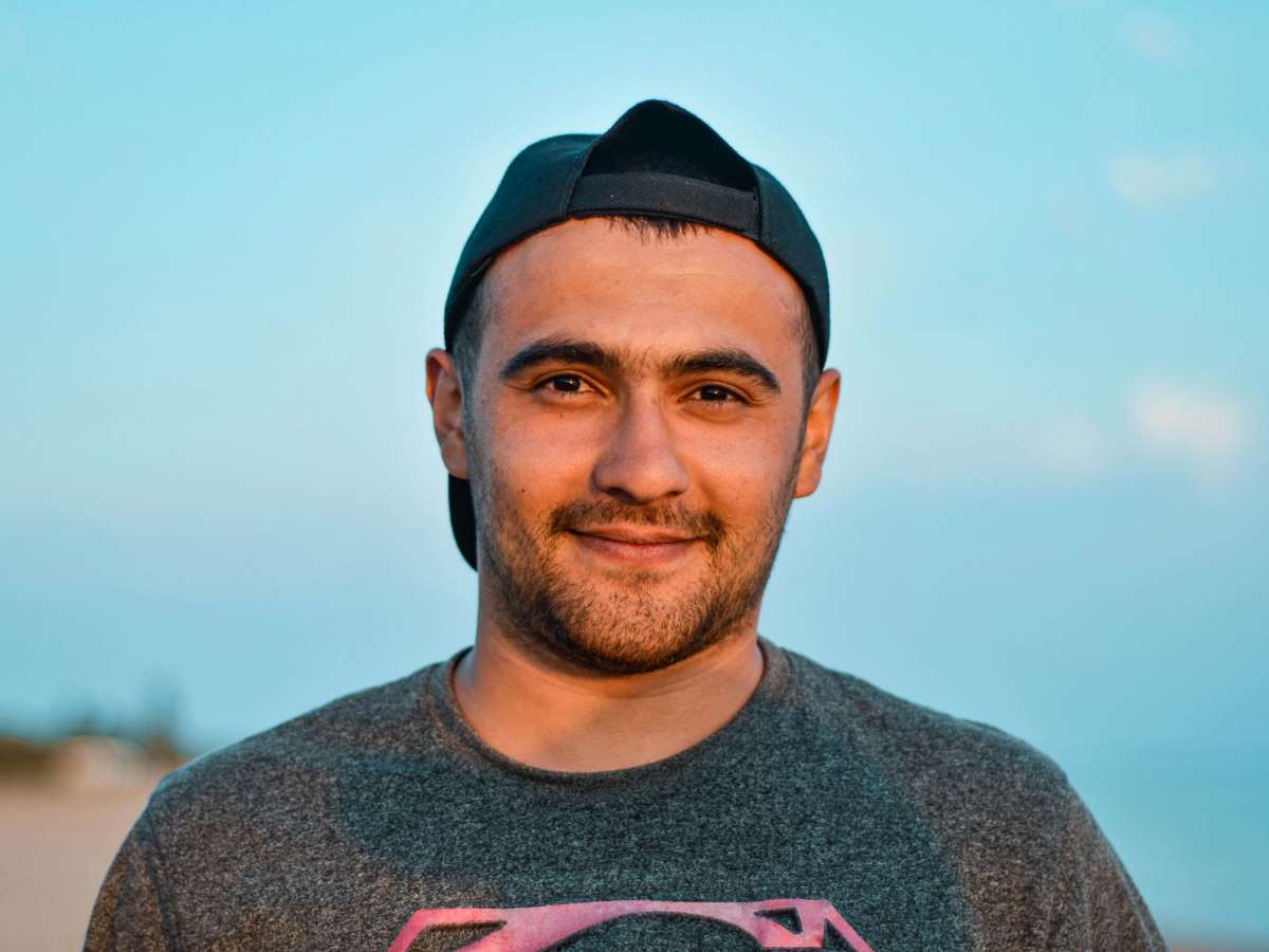 a man with his hat backwards