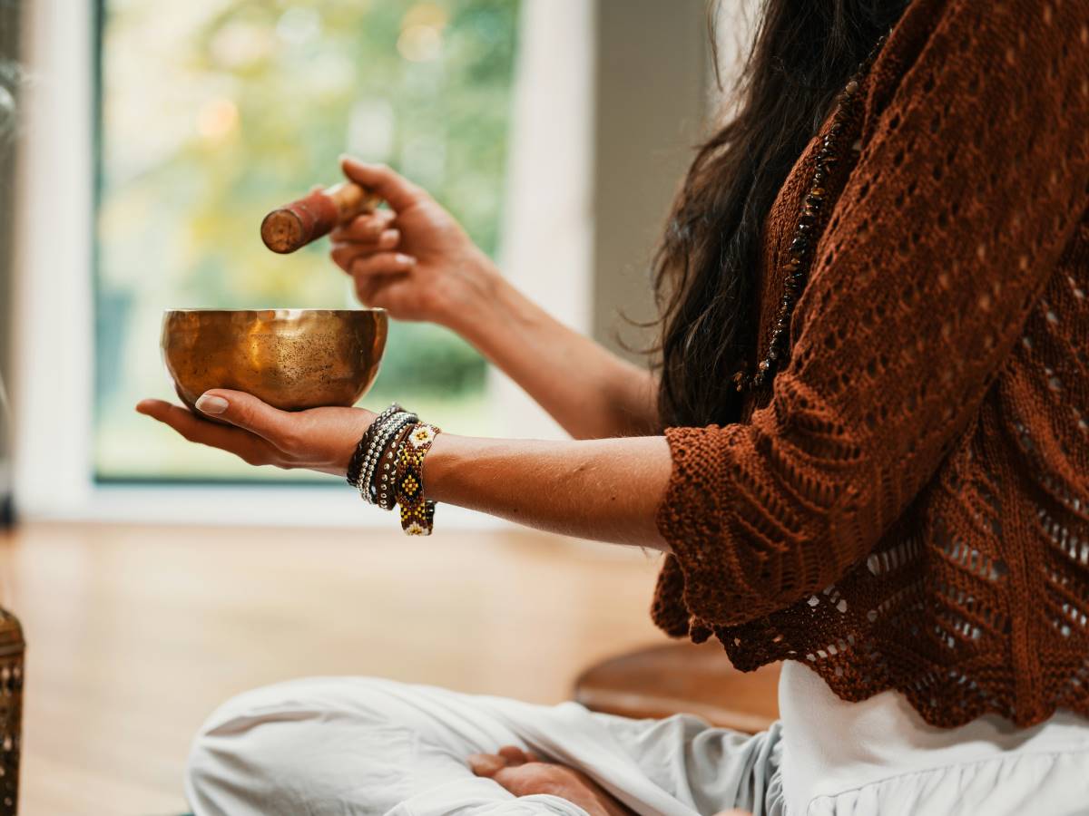 a woman with incense doing yoga